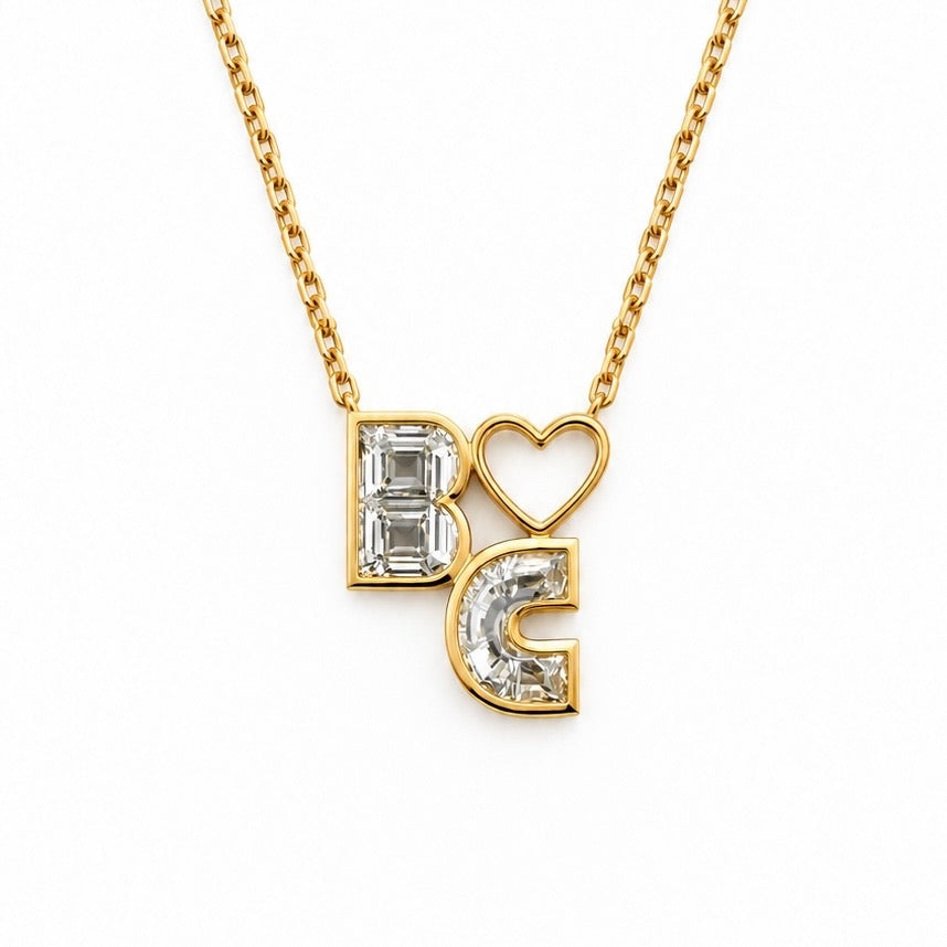 Diamond initial necklace in 14K yellow gold, two lab-grown diamond letters B and C with an open heart on a rolo chain