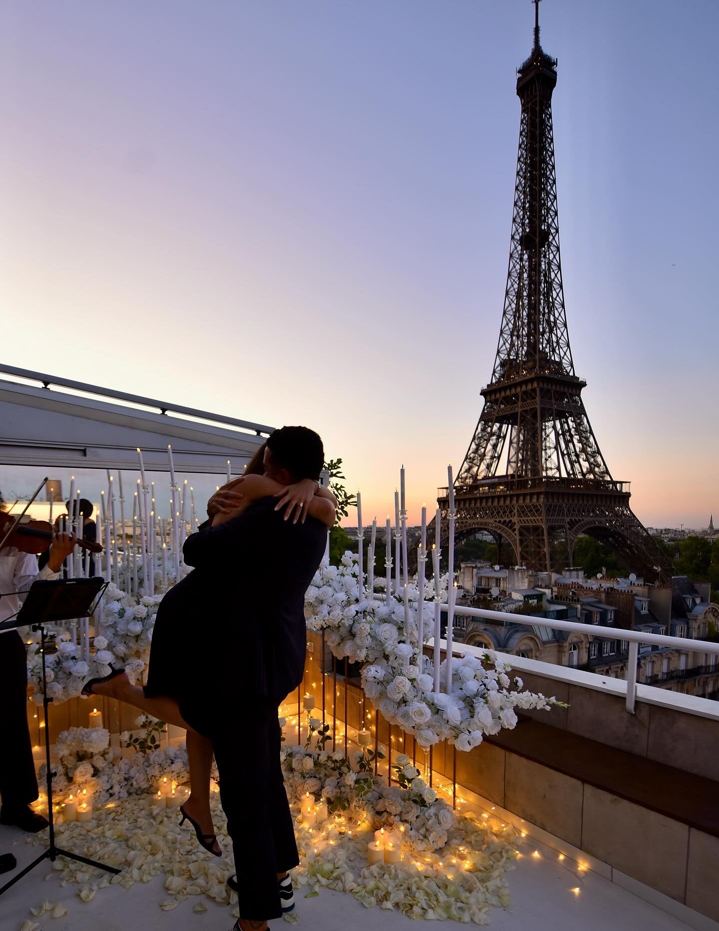 Evening proposal beneath the Eiffel Tower in Paris