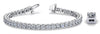 Diamond tennis bracelet in 18k white gold with close-up of four-prong setting