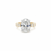 Oval lab diamond engagement ring with illusion setting and reverse halo, 18k yellow gold – front view
