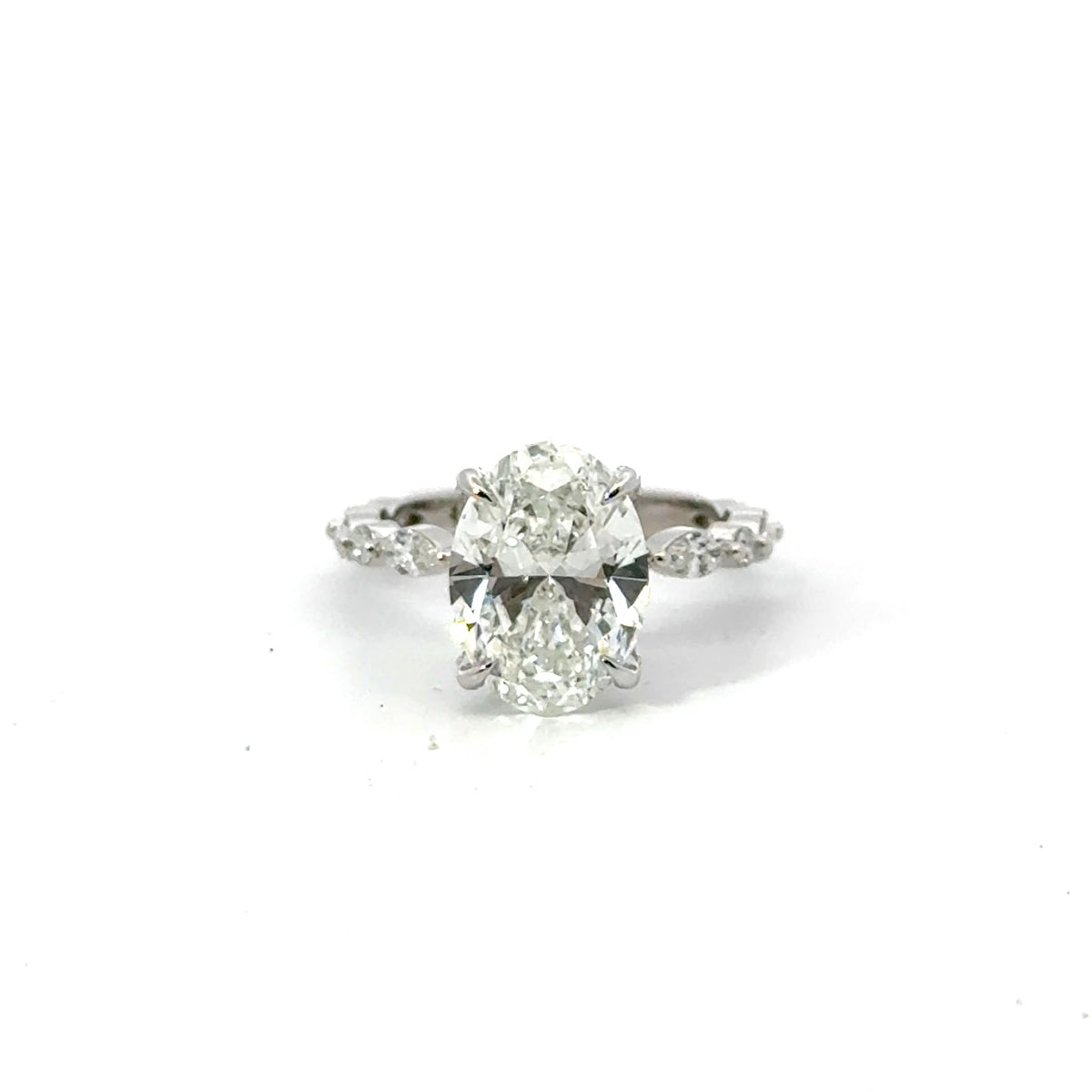 Oval lab diamond ring with marquise station band, 18k white gold – front view