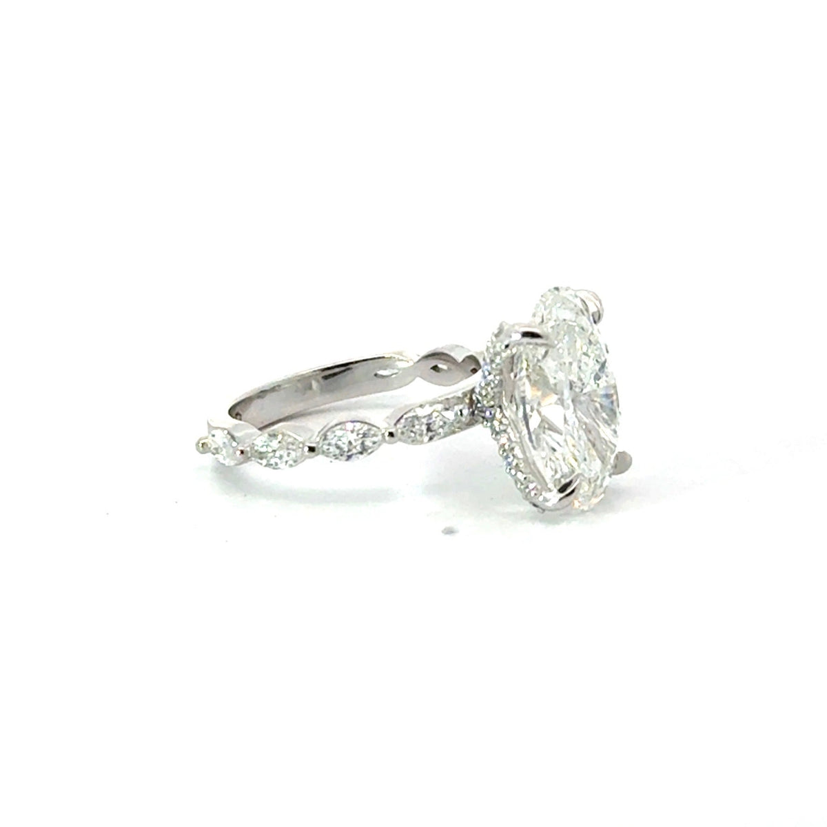 Oval lab diamond ring with marquise station band, 18k white gold – side angle
