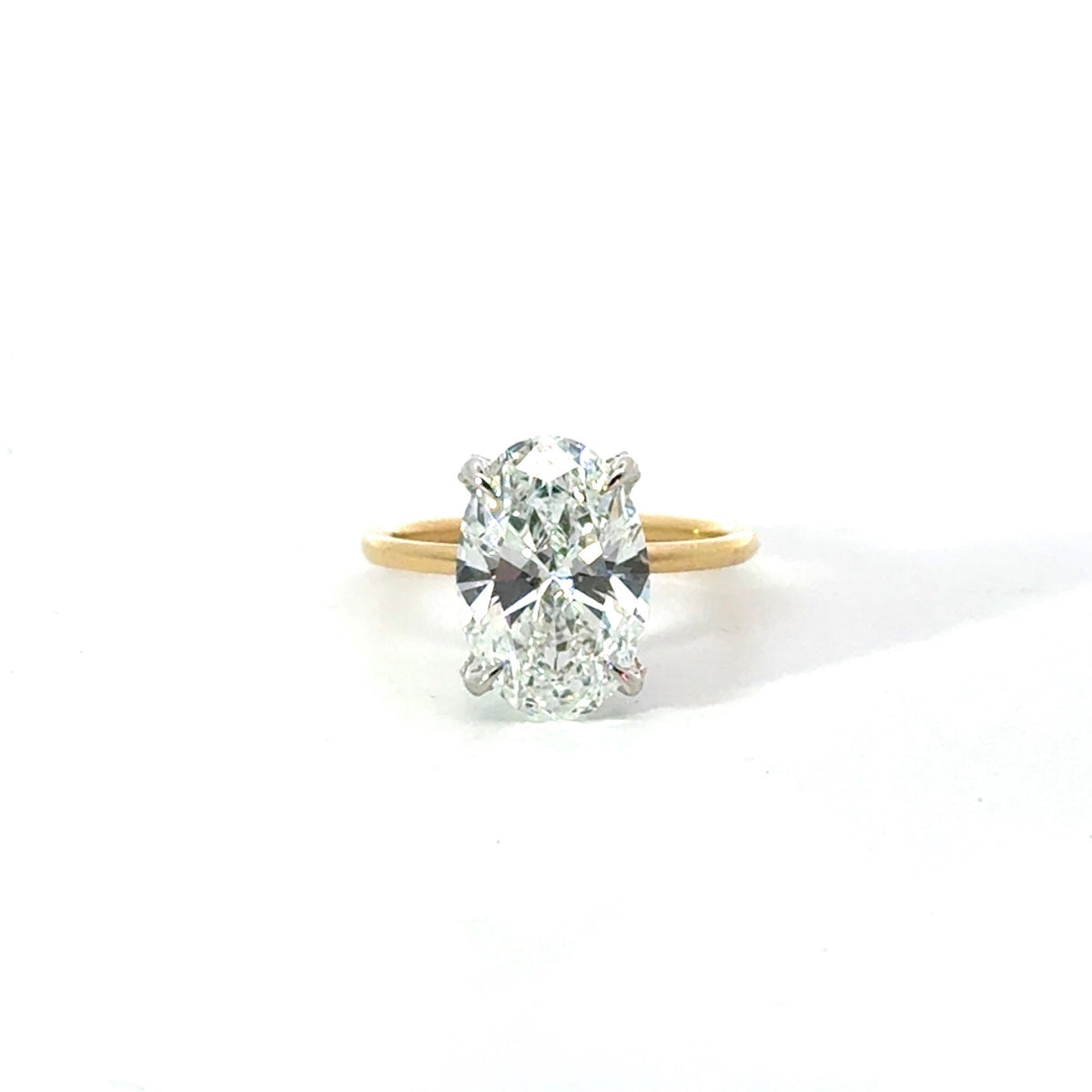 Oval diamond engagement ring, classic 1.50mm tube solitaire & diamond prong design – view 1 of 3