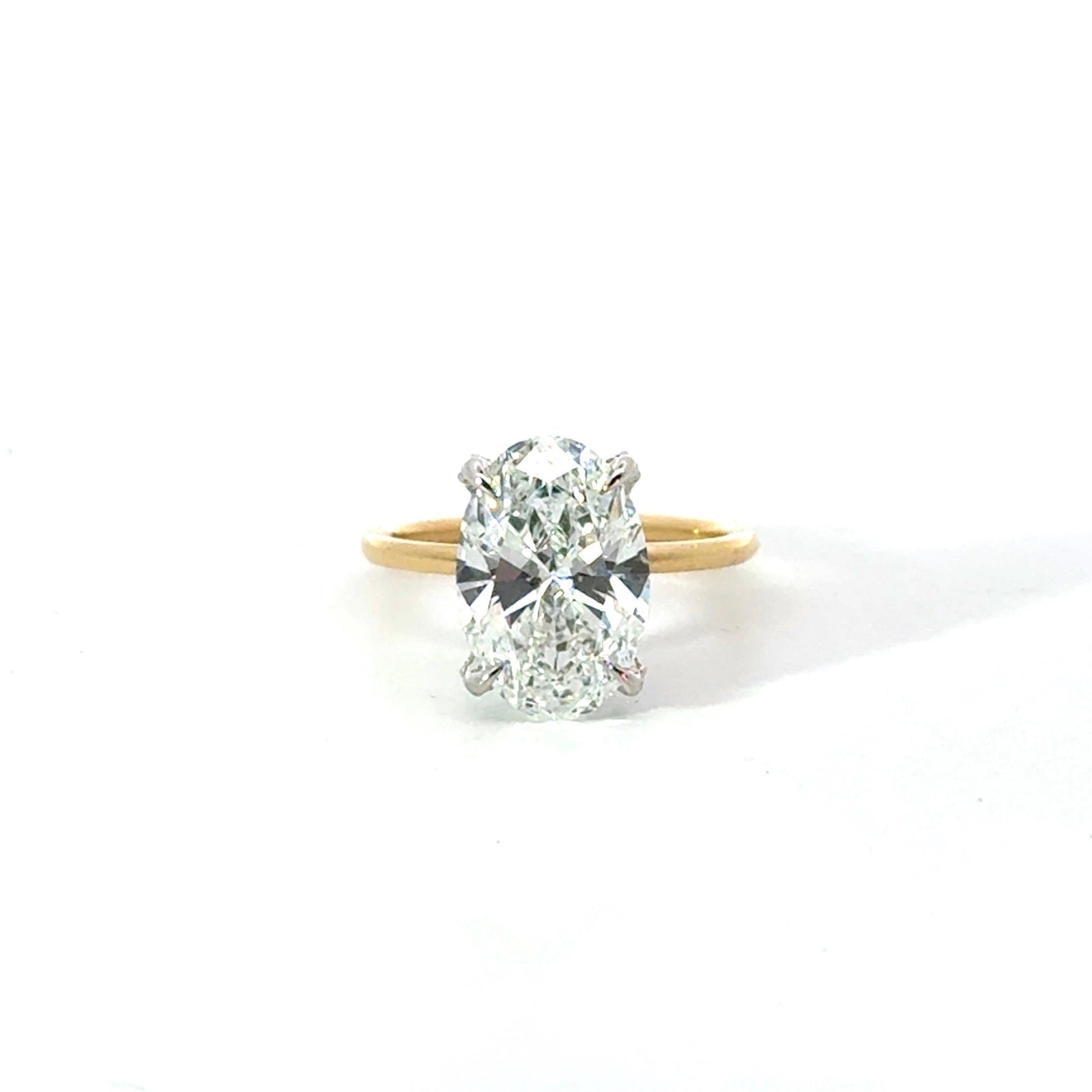 Oval diamond engagement ring, classic 1.50mm tube solitaire & diamond prong design – view 1 of 3