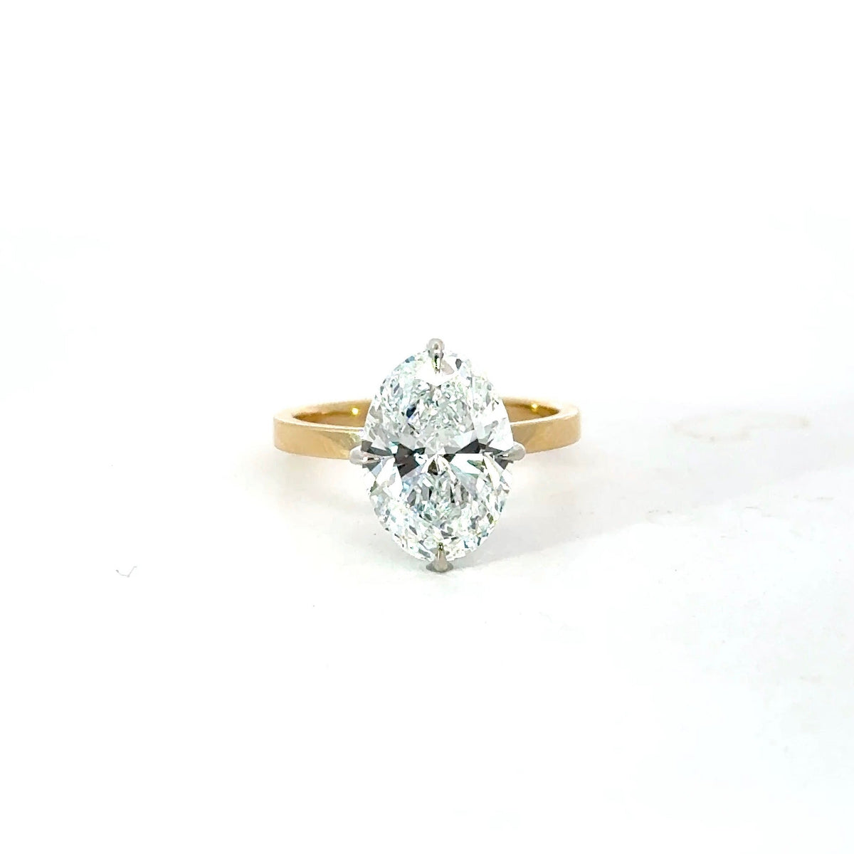 Oval Cut Natural Diamond - Rotated Prongs with a 2MM Cigar Shank and Reverse Halo - Choice of.80ct / 1.00ct / 1.20ct