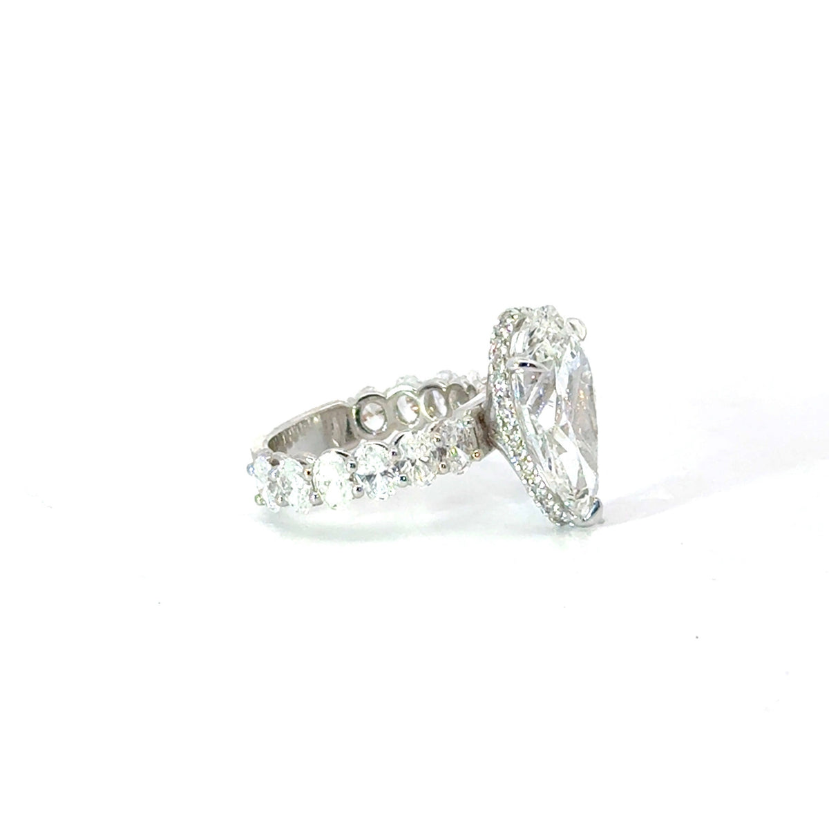 Pear natural diamond engagement ring, oval diamond shank and reverse halo – view 2 of 3