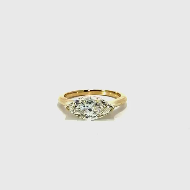 Rotated marquise natural diamond engagement ring, 2mm knife-edge floating design – video