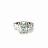 Radiant cut natural diamond engagement ring with reverse halo and radiant eternity band – video
