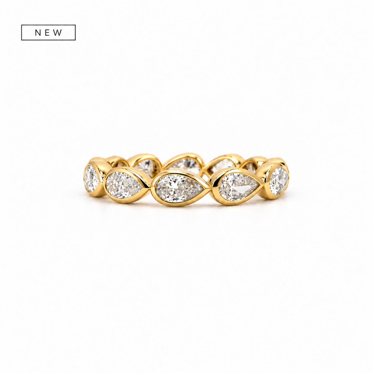 Rotated pear shape ladies diamond wedding band in gold – view 1 of 2