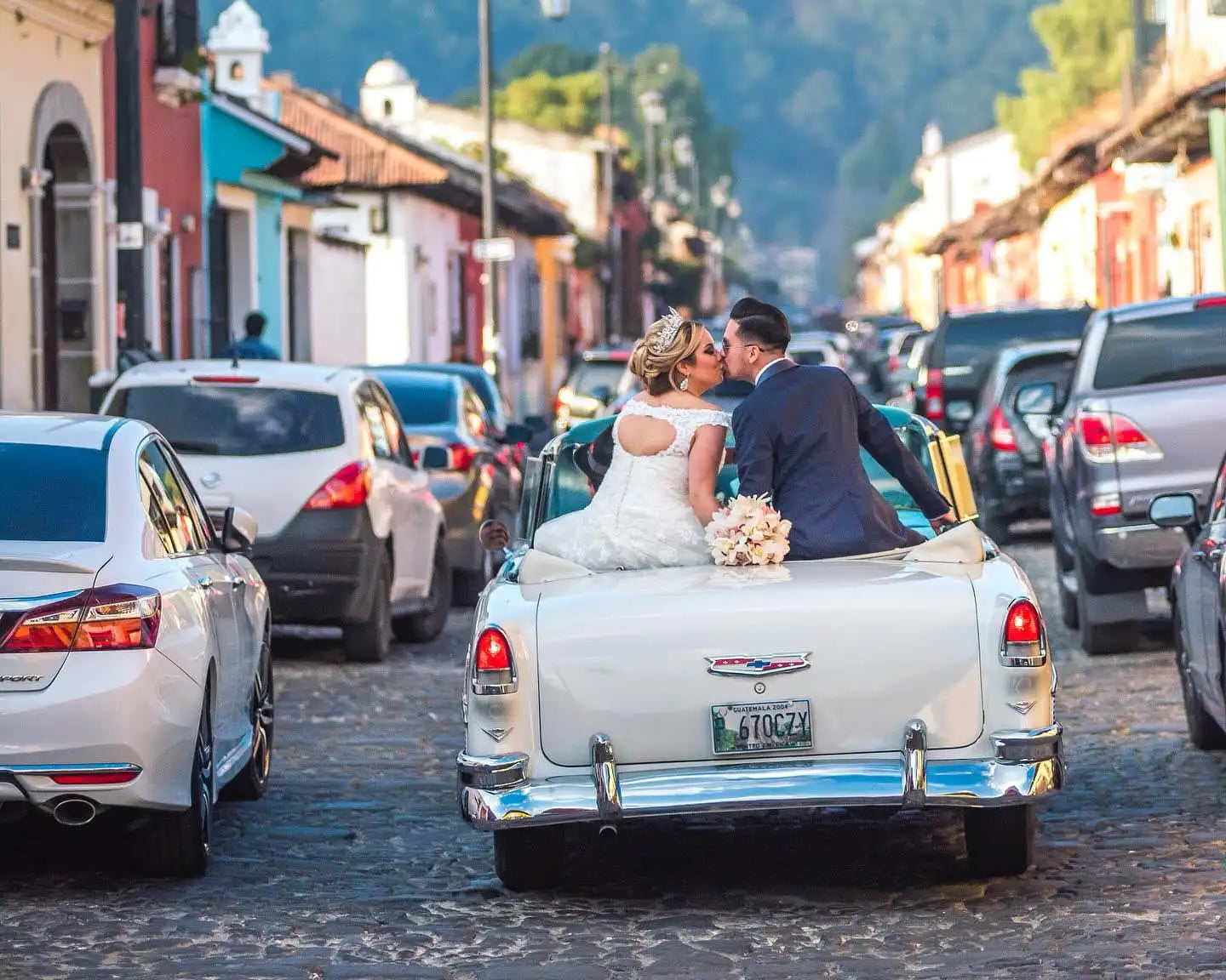 Wedding couple in a vintage convertible